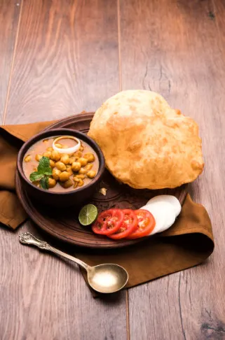 CHOLA POORI WITH CHENNA MASALA (1 PC)