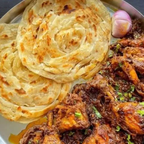 Mixing Parotta (Chicken)