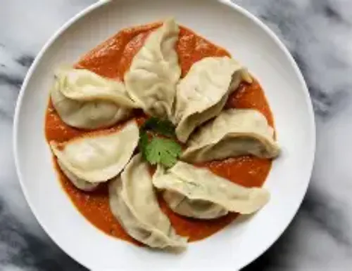 Chicken Butter Momos (10 Pcs)