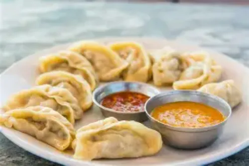 Chicken Tomrich Momos (5 Pcs)