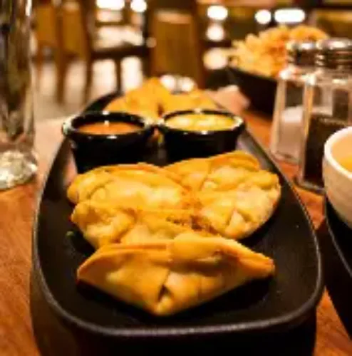 Mushroom Tomrich Momos (10 Pcs)