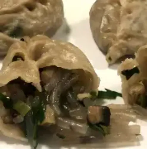 Mushroom Tomrich Momos (5 Pcs)