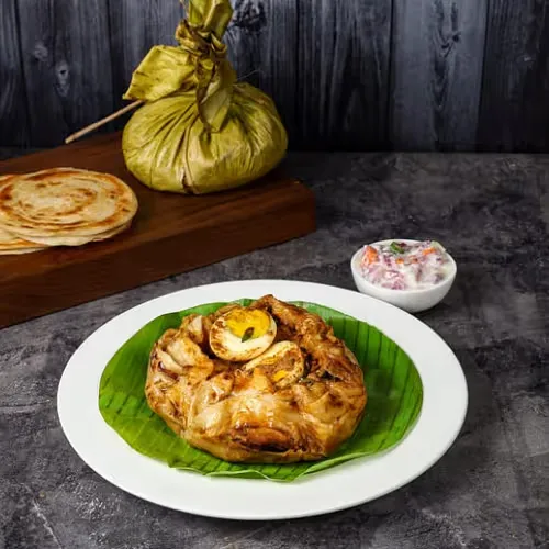 Chicken Kizhi Porotta